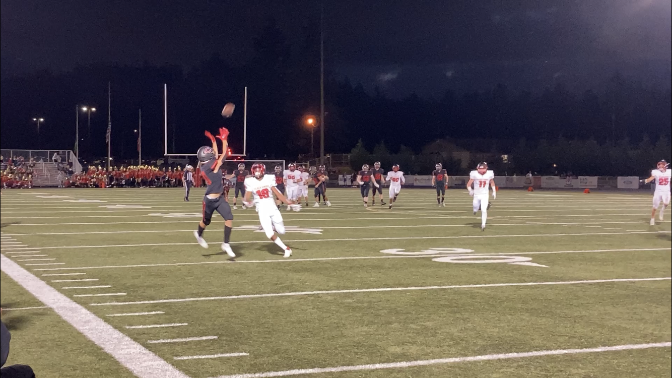 Camas WR Nathan Criddle hauls in a pass from QB Taylor Ioane at Doc Harris Stadium.
